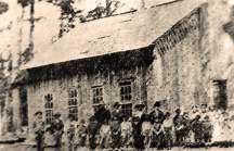 1st Coquille School where church met.